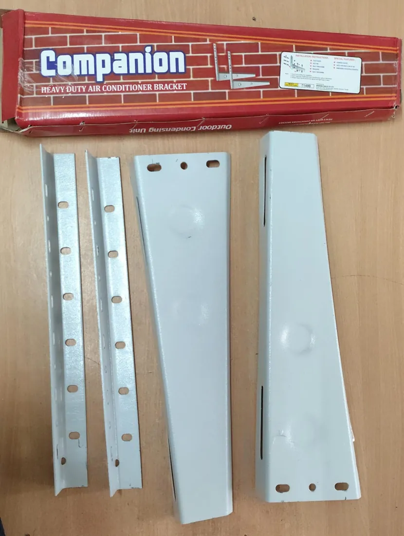 Companion heavy-duty AC outdoor unit bracket, parts unpacked below the box