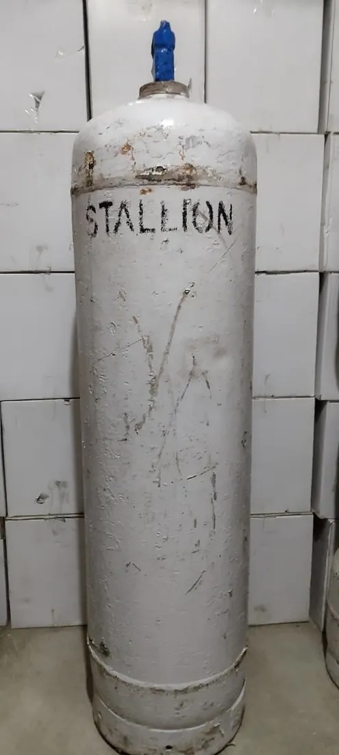 Large Stallion R-134a refrigerant cylinder showing the Stallion stencil, at Shree Suswani Refrigeration in Secunderabad